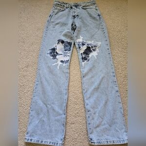 Stylish Women's Light Blue Jeans with Bird Design